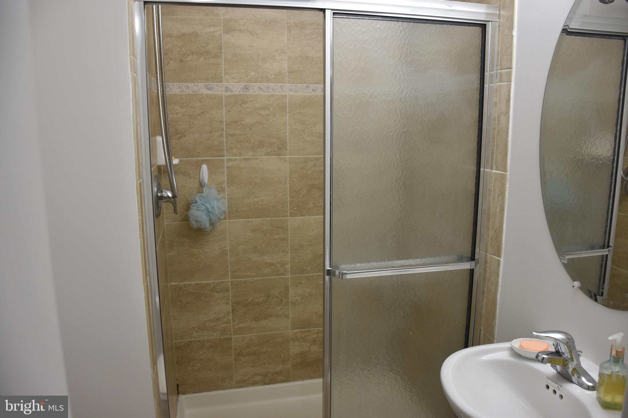 803 Ryan Street Baltimore, MD 21230 - Photo 6 of 41 a bathroom with a sink and a mirror