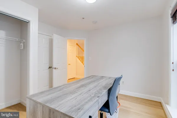 a view of a livingroom with furniture and a flat screen tv