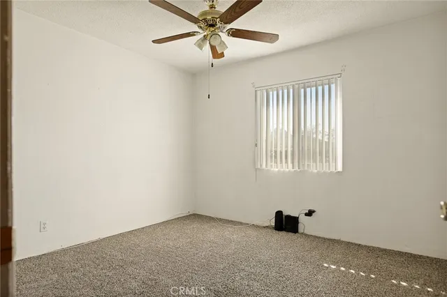 a view of a window in an empty room