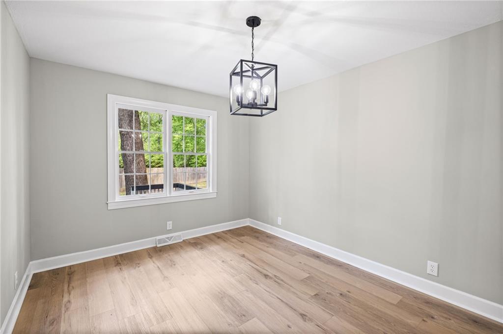 7 East Creekview Drive Southwest Rome, GA 30165 - Photo 15 of 43 a view of wooden floor chandelier and closet in a room