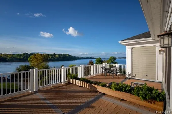 a view of a roof deck with couches