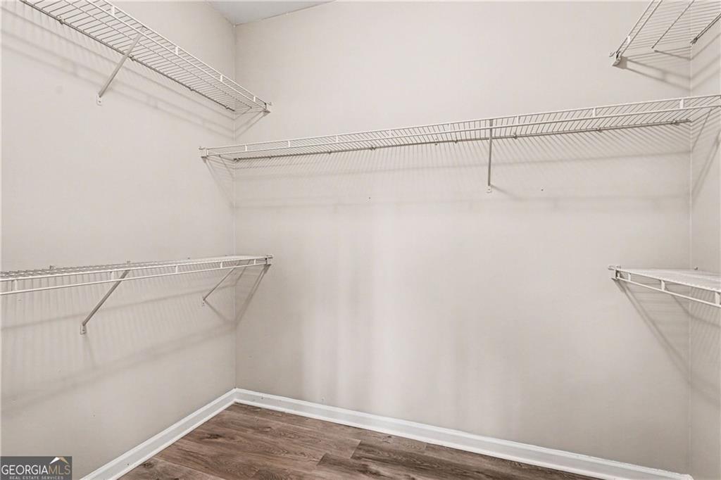 159 Sable Trace Trail Acworth, GA 30102 - Photo 20 of 40 a view of a room with racks on the wall