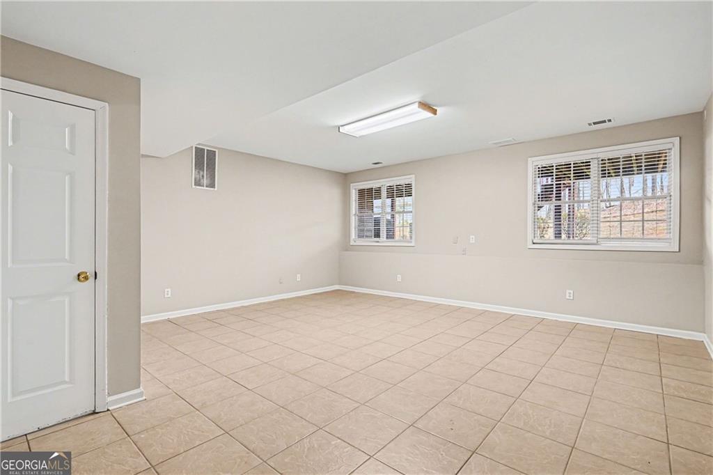 159 Sable Trace Trail Acworth, GA 30102 - Photo 24 of 40 a view of an empty room with a window