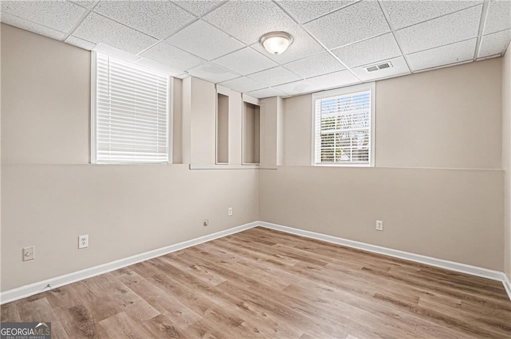 159 Sable Trace Trail Acworth, GA 30102 - Photo 27 of 40 a view of empty room with wooden floor and fan