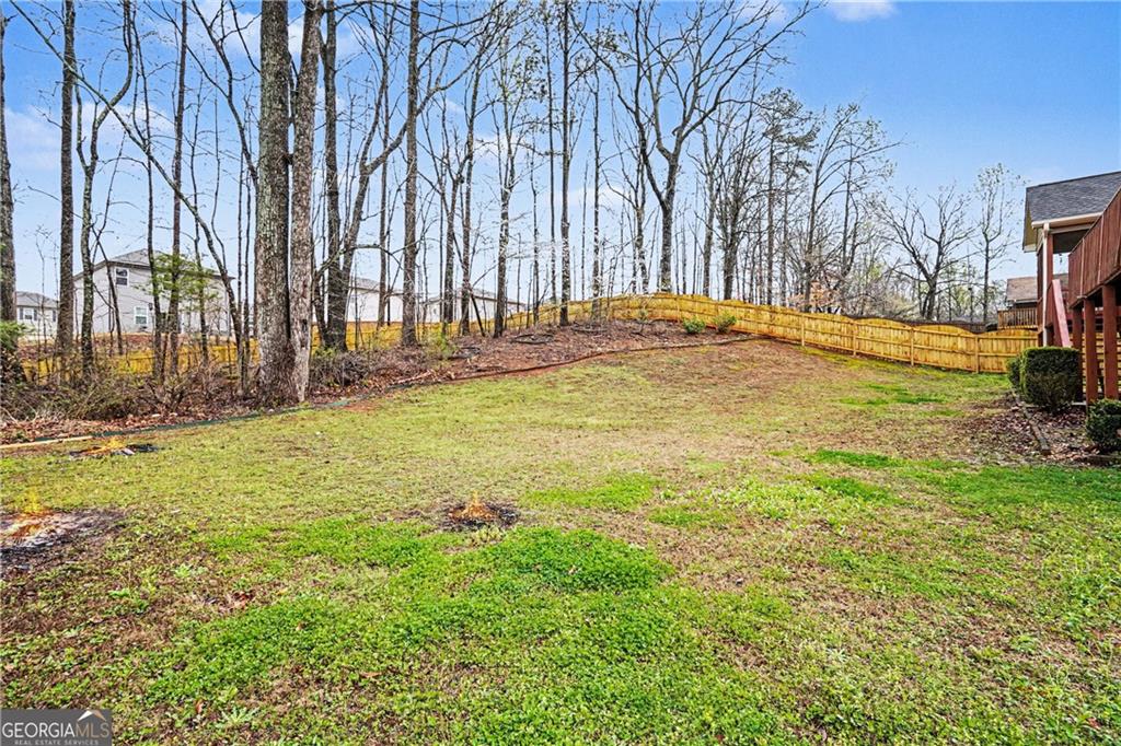 159 Sable Trace Trail Acworth, GA 30102 - Photo 37 of 40 a swimming pool with trees in the background