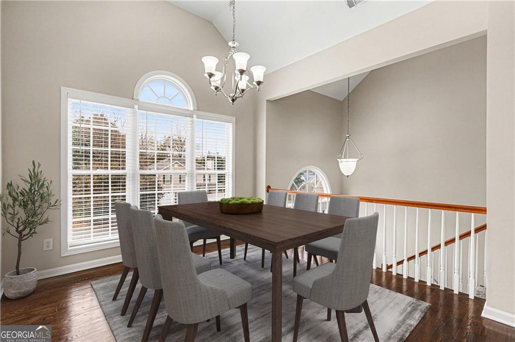 159 Sable Trace Trail Acworth, GA 30102 - Photo 8 of 40 a view of a dining room with furniture window and wooden floor