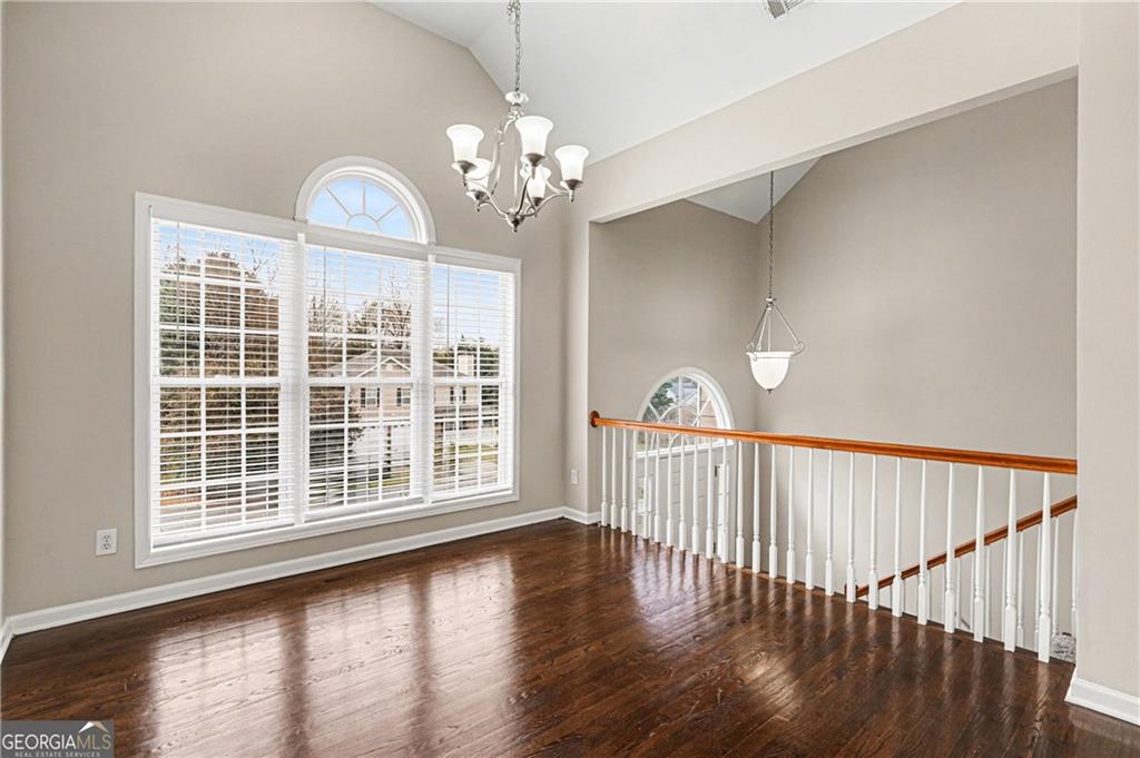 159 Sable Trace Trail Acworth, GA 30102 - Photo 9 of 40 a view of a livingroom with wooden floor and a large window