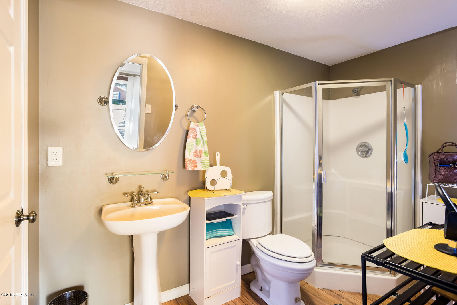 1435 Nicholson Road Jacksonville, FL 32207 - Photo 24 of 24 a bathroom with a sink toilet and shower