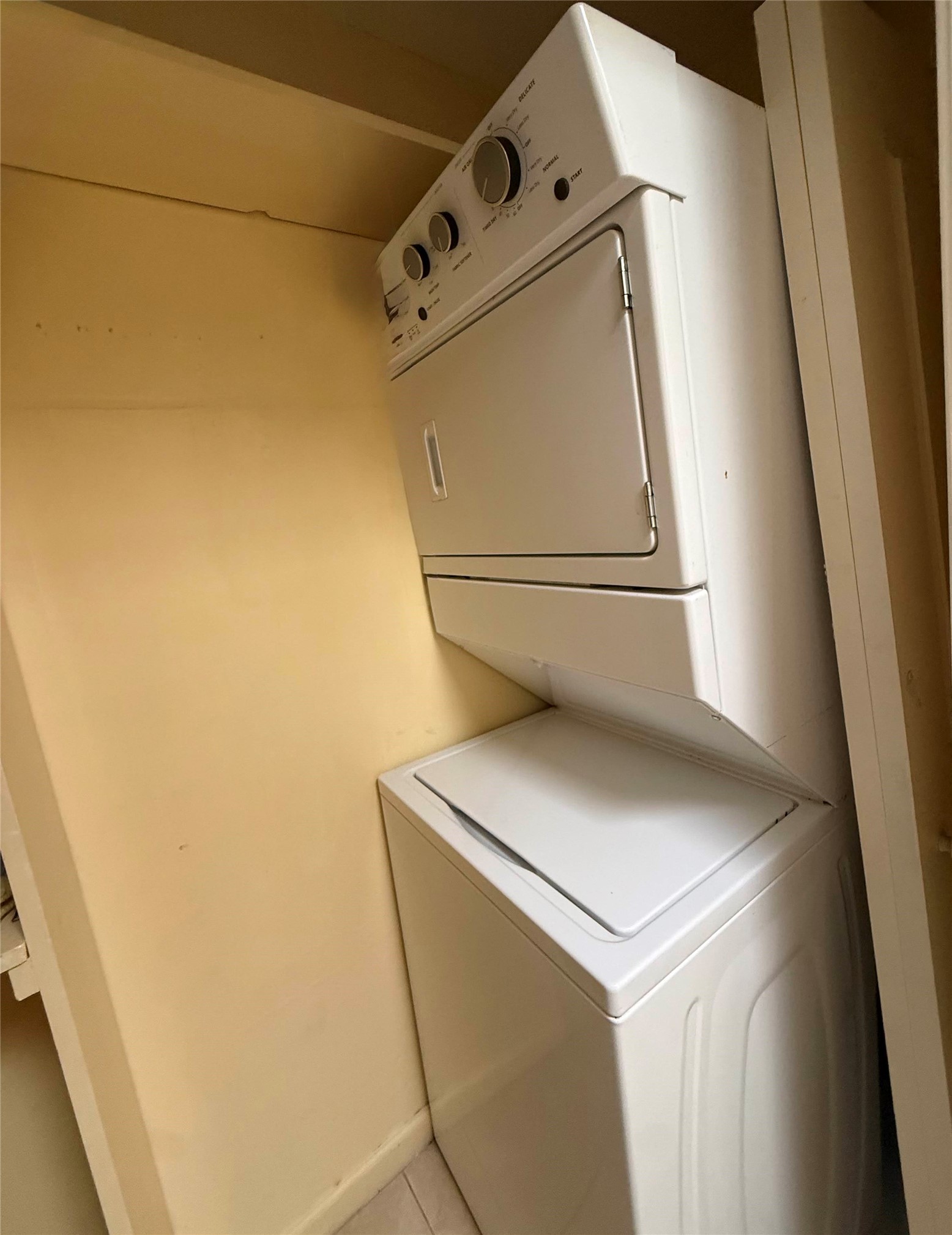 7047 Bissonnet Street, Unit 32 Houston, TX 77074 - Photo 12 of 19 a utility room with dryer and washer