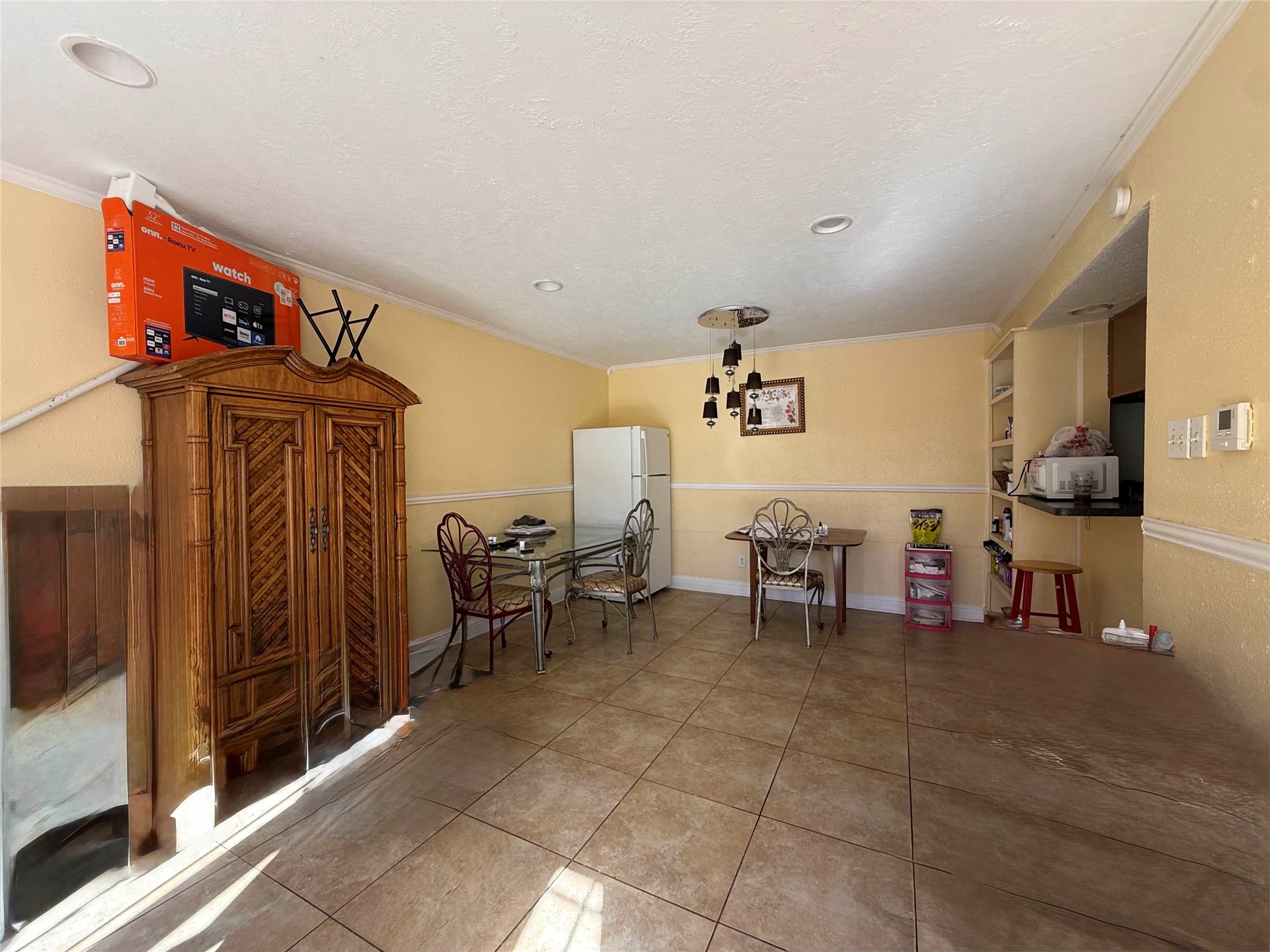 7047 Bissonnet Street, Unit 32 Houston, TX 77074 - Photo 2 of 19 a view of a bunch of chairs in a room