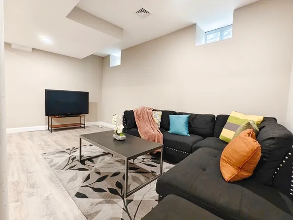 $919,000 | 58 Dustin Street, Unit 1, Boston, MA 02135