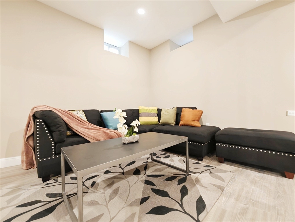 58 Dustin Street, Unit 1 Boston, MA 02135 - Photo 18 of 29 a view of a living room with furniture