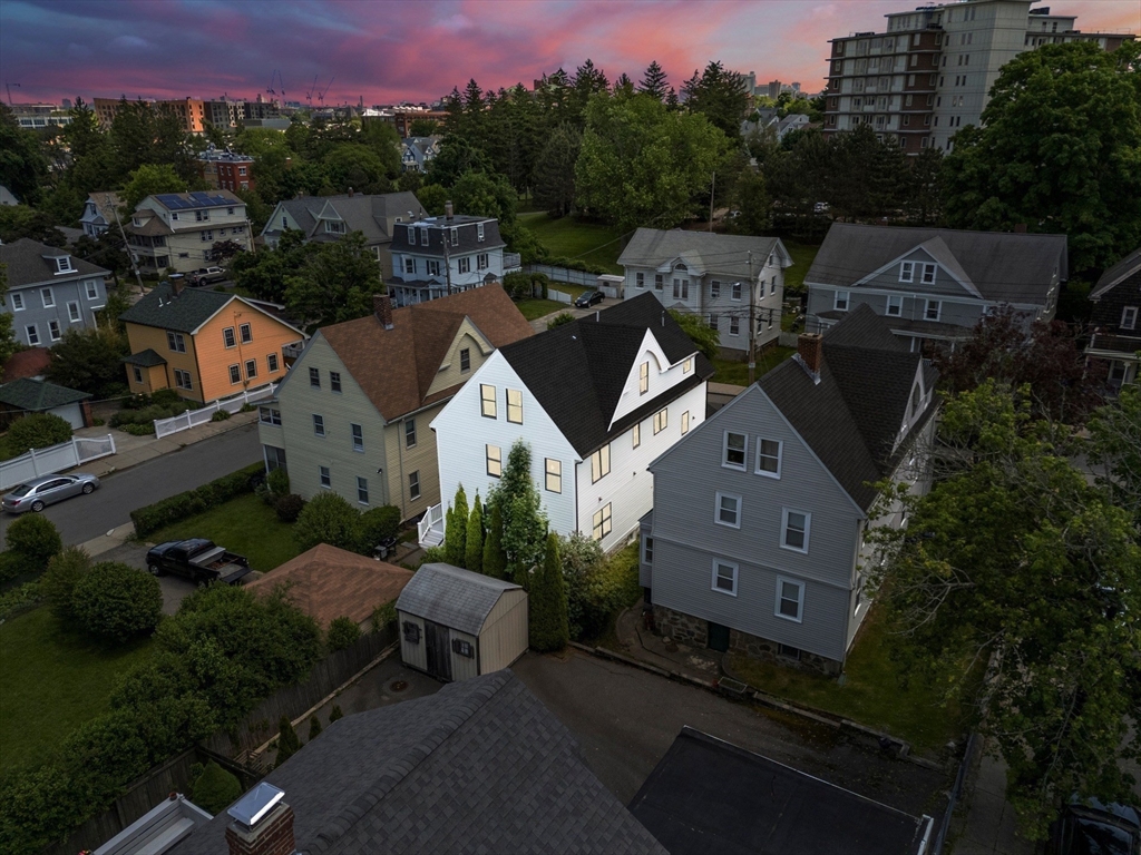 58 Dustin Street, Unit 1 Boston, MA 02135 - Photo 28 of 29 an aerial view of a house with a yard