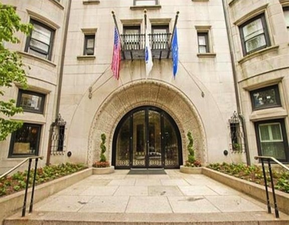 a front view of a building with glass windows