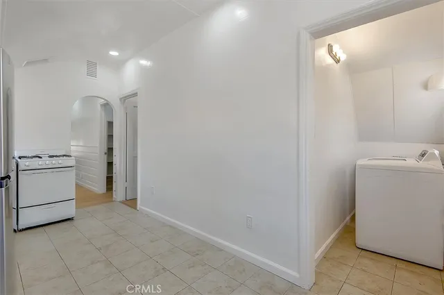 a view of a storage & utility room with washer and dryer