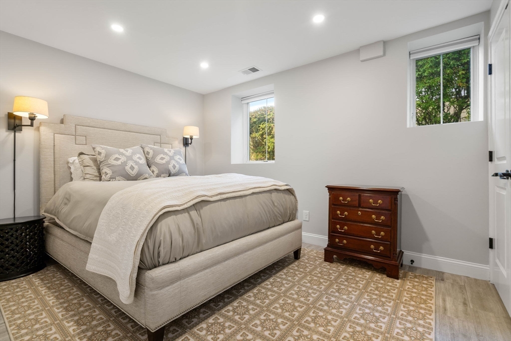 35 Algonquin Road, Unit 35 Chestnut Hill, MA 02467 - Photo 27 of 38 a bedroom with a bed and a window
