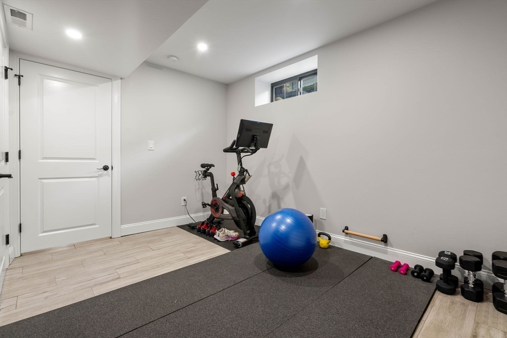 35 Algonquin Road, Unit 35 Chestnut Hill, MA 02467 - Photo 29 of 38 a view of a room with gym equipment