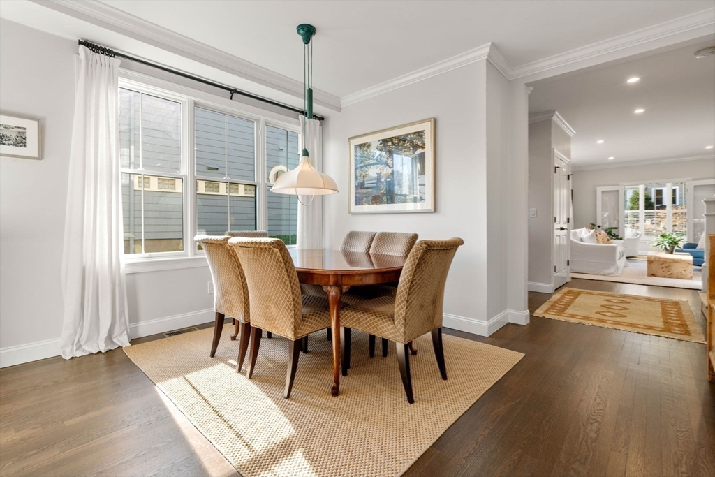 35 Algonquin Road, Unit 35 Chestnut Hill, MA 02467 - Photo 8 of 38 a view of a dining room with furniture window and wooden floor