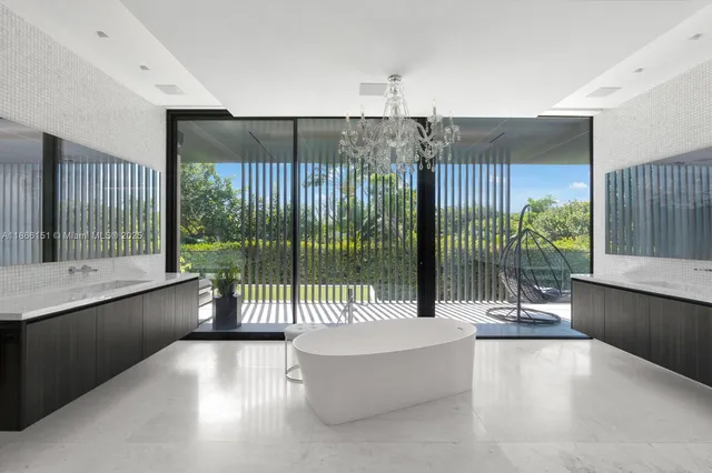 a spacious bathroom with a bathtub sink and toilet