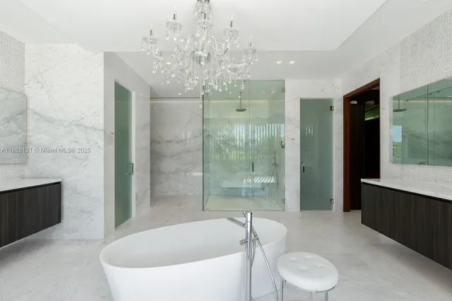 a balcony with potted plants in front of it