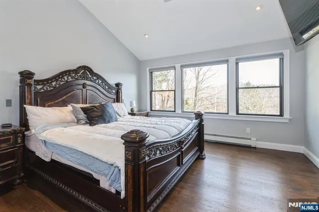 a house with lots of trees in the background