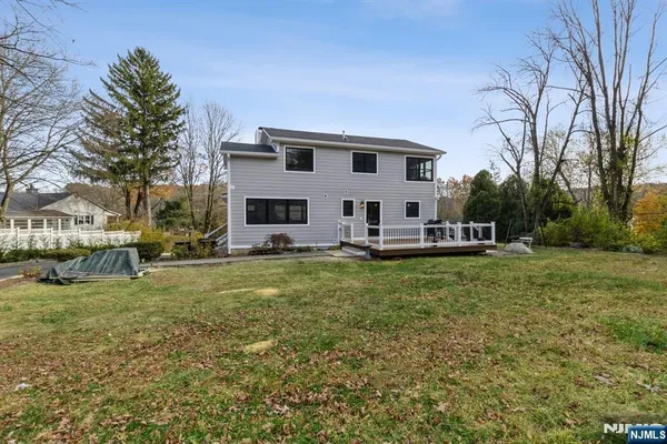 a view of a house with a big yard