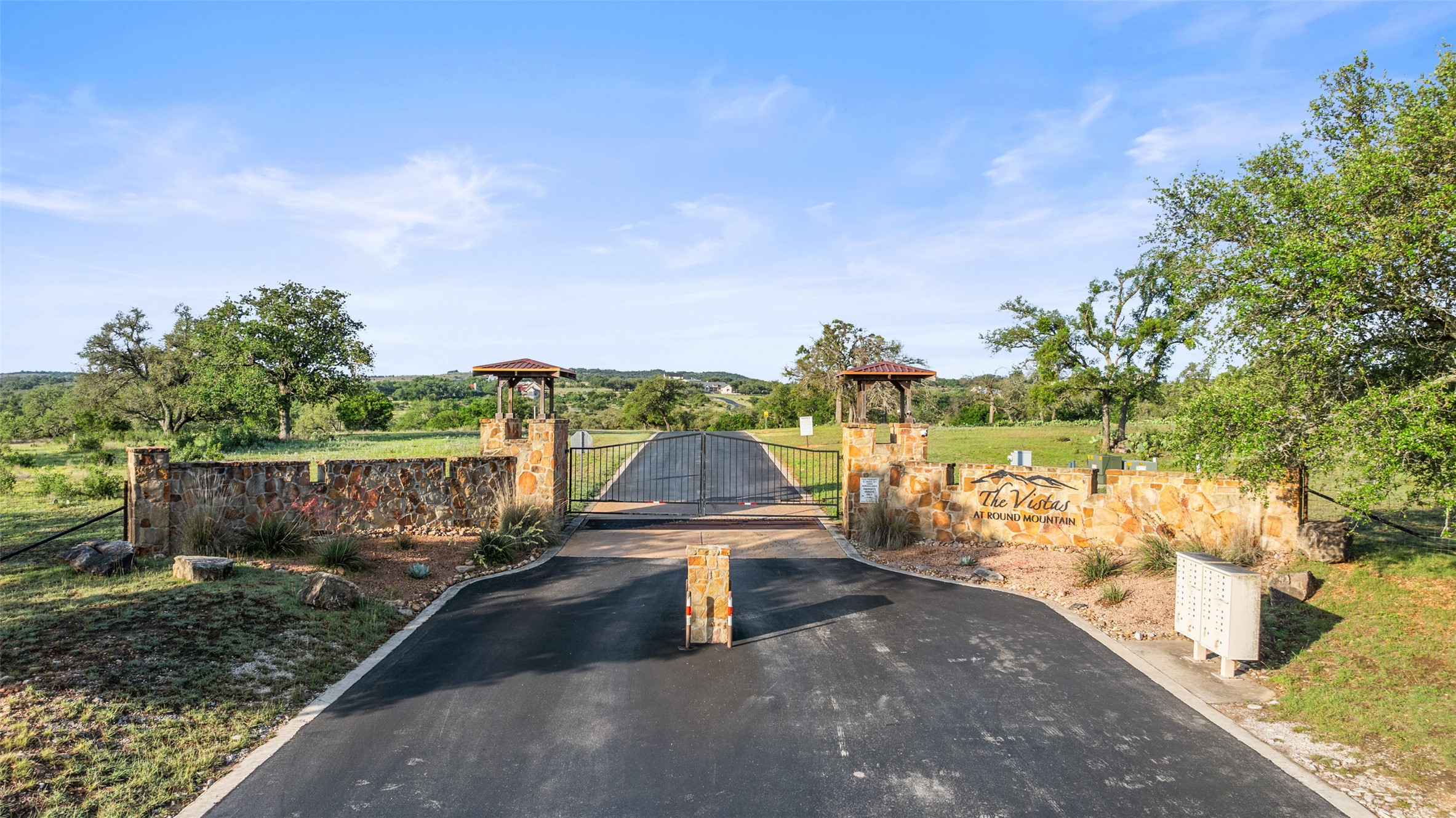 Lot 3 Vista Rdg Drive Round Mountain, TX 78663 - Photo 15 of 15 View of asphalt road with a gate