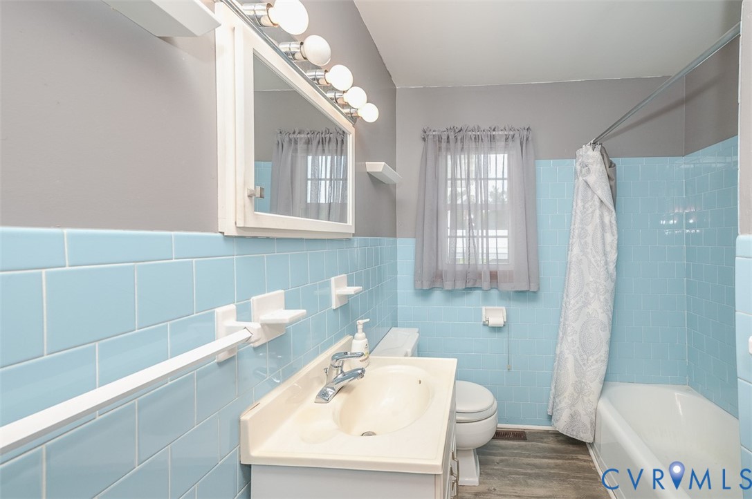 581 Smokey Road Aylett, VA 23009 - Photo 19 of 28 Bathroom featuring light blue wall tiling, a white