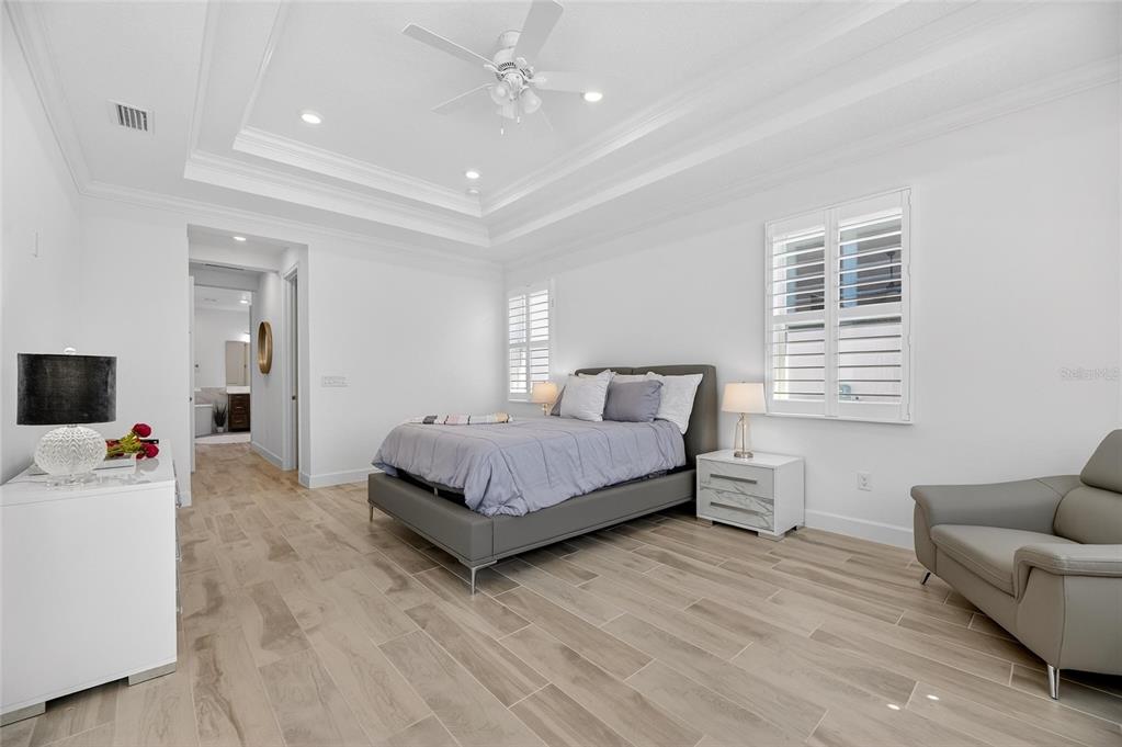 994 Signet Drive Apollo Beach, FL 33572 - Photo 33 of 98 a bedroom with a bed and a couch