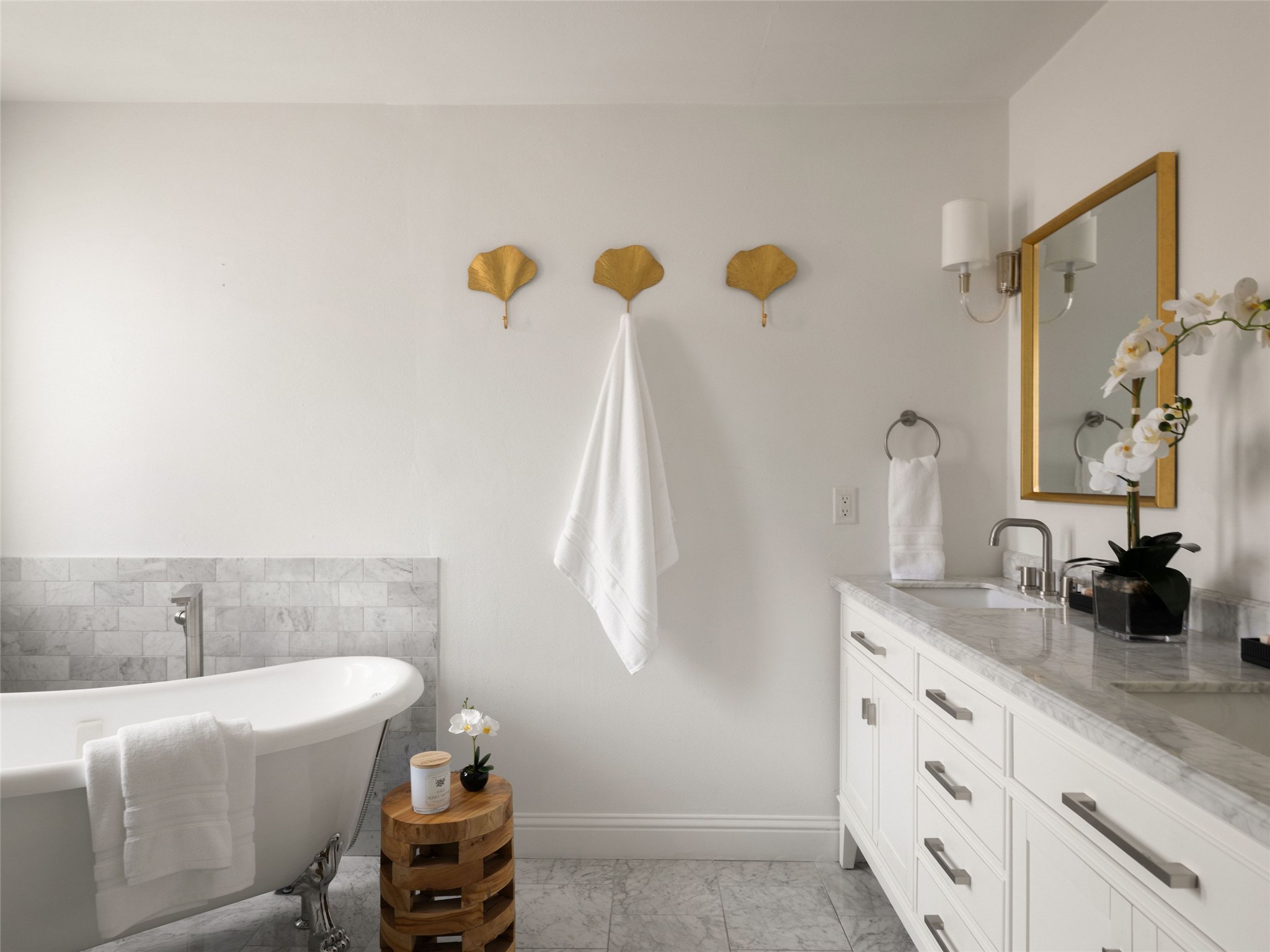 1937 Rue De St Tropez, Unit 10 Austin, TX 78746 - Photo 21 of 39 a bathroom with a sink and a mirror