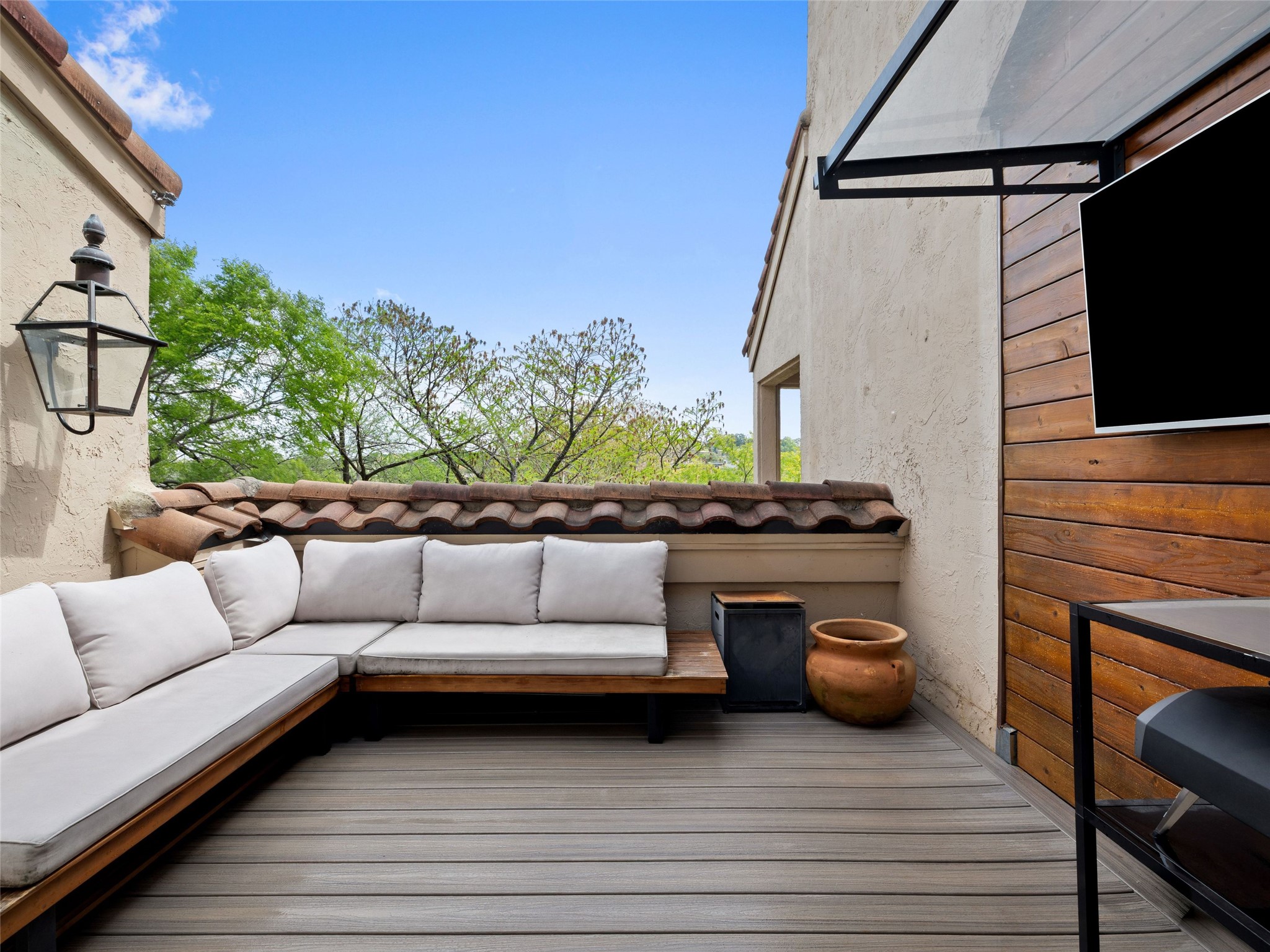 1937 Rue De St Tropez, Unit 10 Austin, TX 78746 - Photo 23 of 39 a view of a couches in a patio