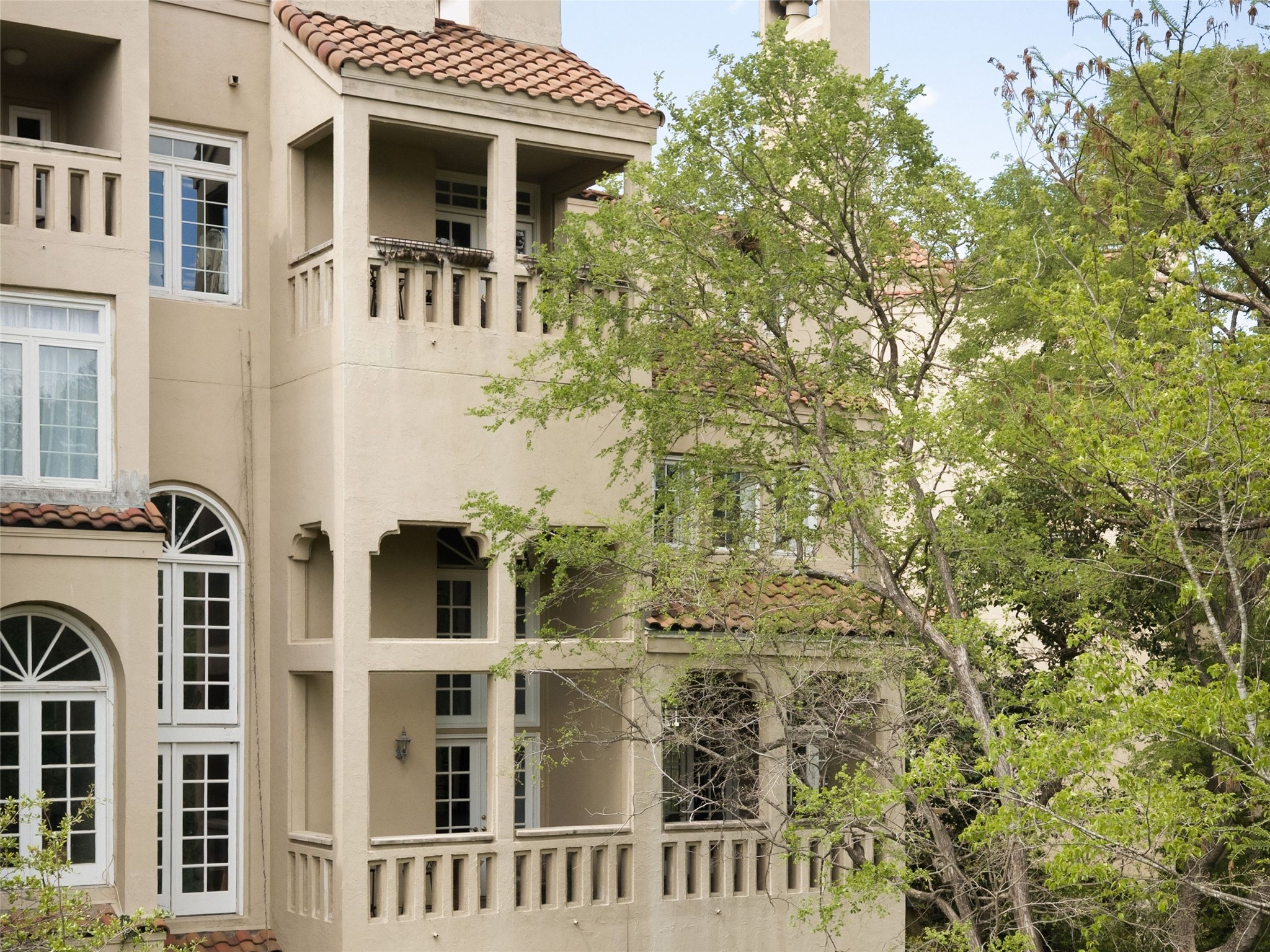 1937 Rue De St Tropez, Unit 10 Austin, TX 78746 - Photo 29 of 39 a front view of a multi story residential apartment building