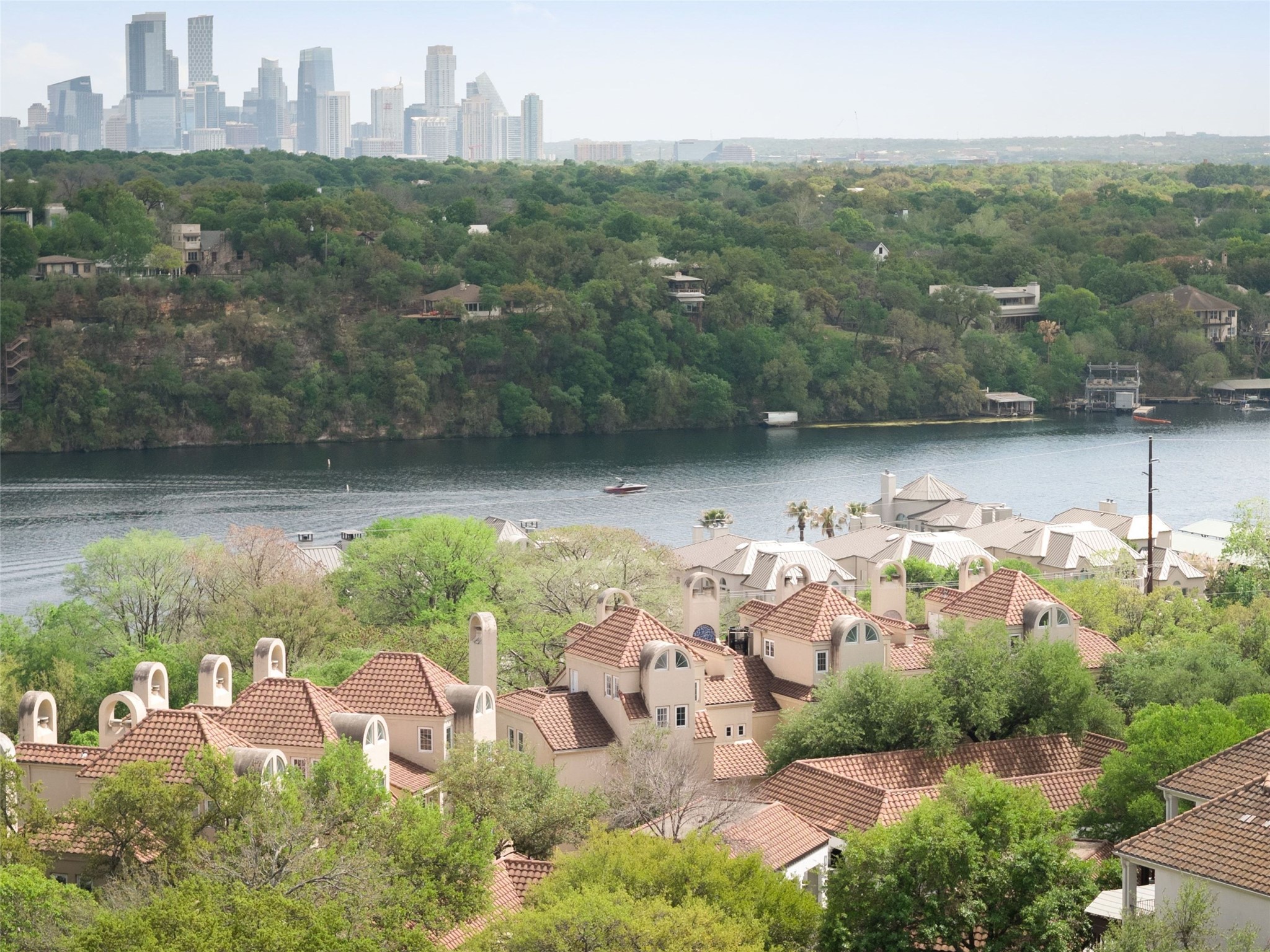1937 Rue De St Tropez, Unit 10 Austin, TX 78746 - Photo 4 of 39 an aerial view of multiple house