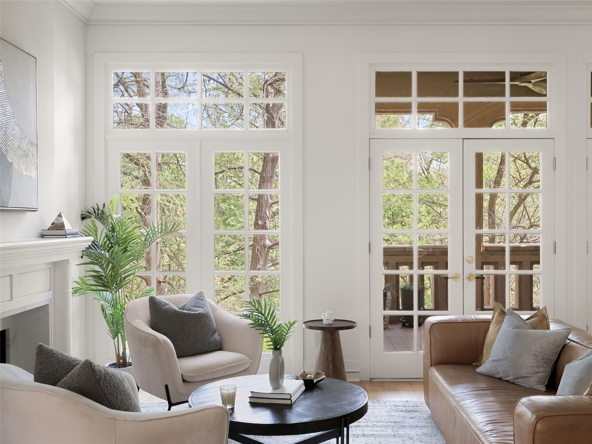 1937 Rue De St Tropez, Unit 10 Austin, TX 78746 - Photo 5 of 39 a living room with furniture and a large window