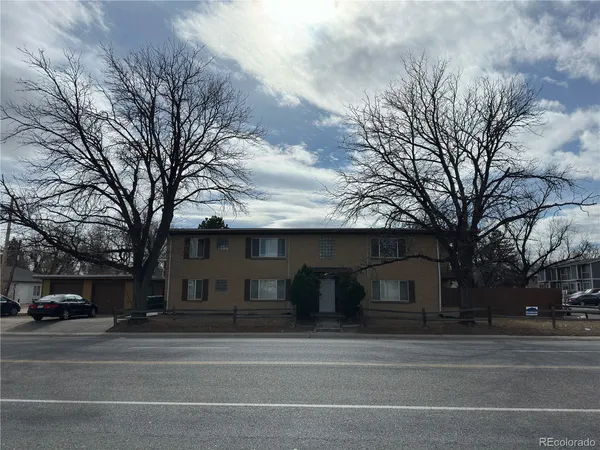 front view of a house with a trees