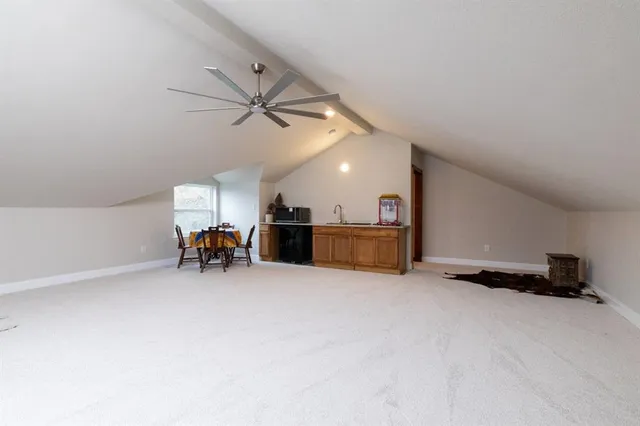 a view of a projector room with a ceiling fan