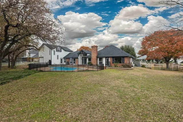 a view of house with outdoor space