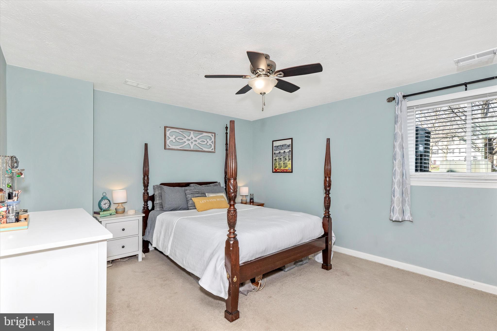 2102 Whitehall Road, Unit BC Frederick, MD 21702 - Photo 14 of 29 a bed room with a bed and a window