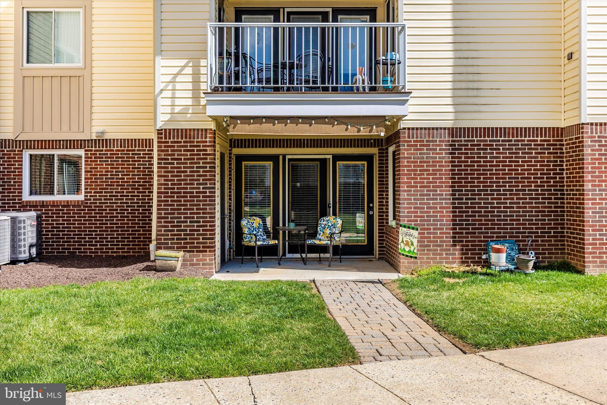 2102 Whitehall Road, Unit BC Frederick, MD 21702 - Photo 23 of 29 a view of a house with a yard and a large window