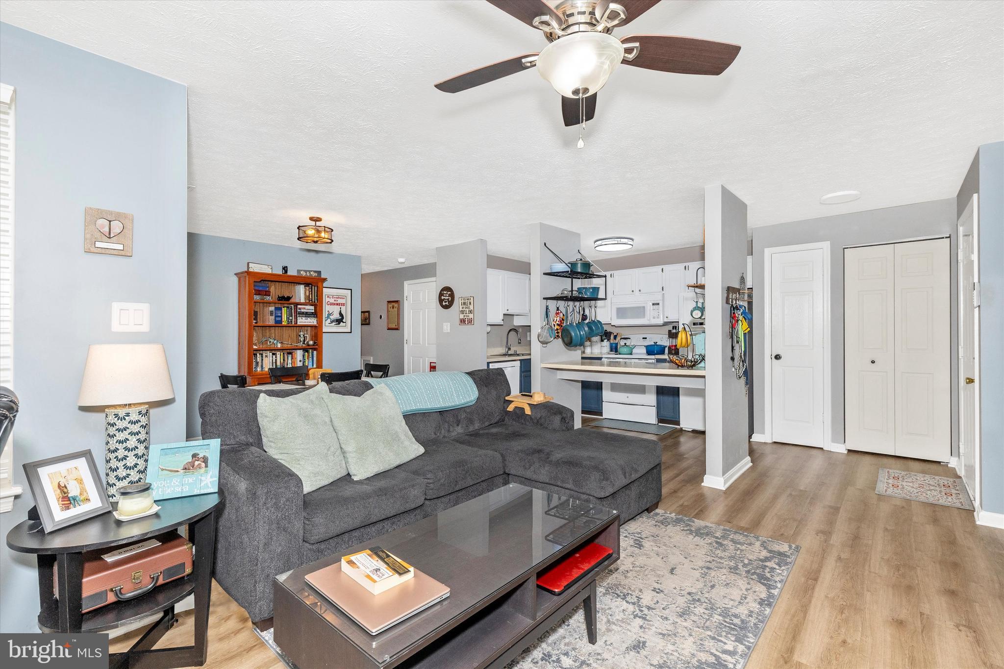 2102 Whitehall Road, Unit BC Frederick, MD 21702 - Photo 4 of 29 a living room with furniture and a wooden floor