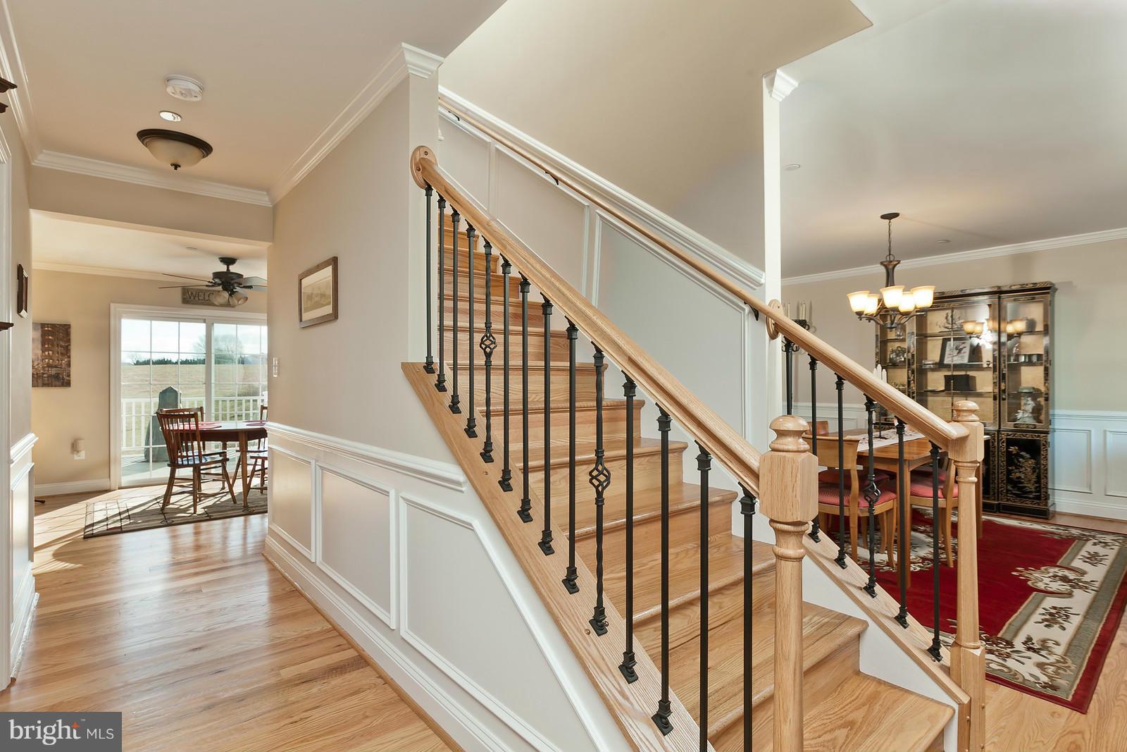 4901 Bartholows Road Mount Airy, MD 21771 - Photo 6 of 29 Impressive oak staircase w/ metal balusters