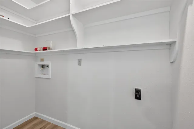 a view of an empty walk in closet