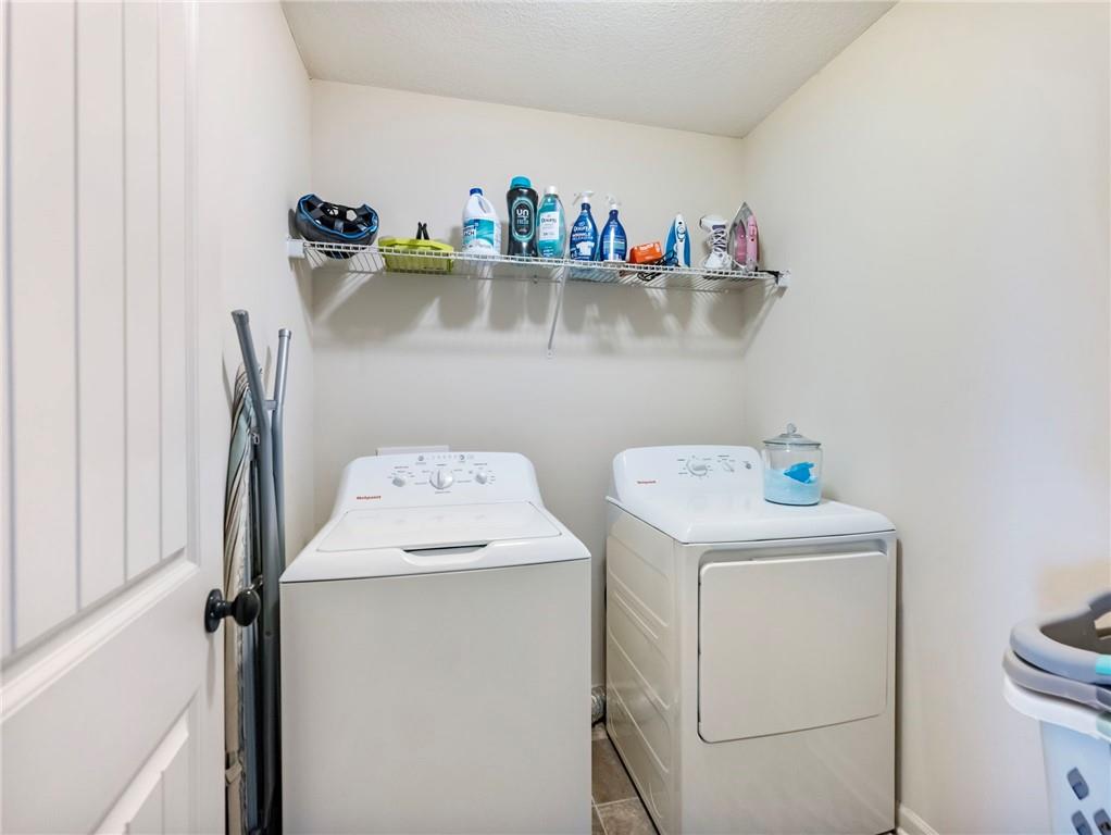 476 River Mist Circle Jefferson, GA 30549 - Photo 23 of 44 a utility room with dryer and washer
