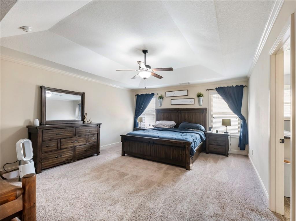 476 River Mist Circle Jefferson, GA 30549 - Photo 24 of 44 a bedroom with a bed and wooden floor