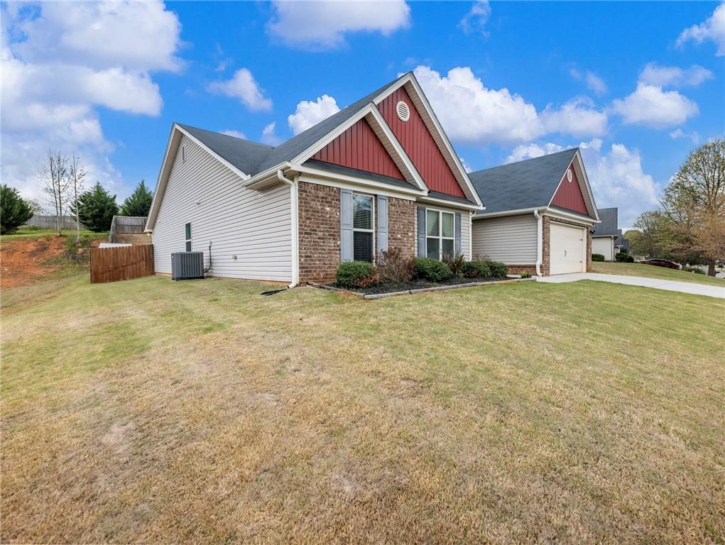 476 River Mist Circle Jefferson, GA 30549 - Photo 33 of 44 a view of a house with a yard