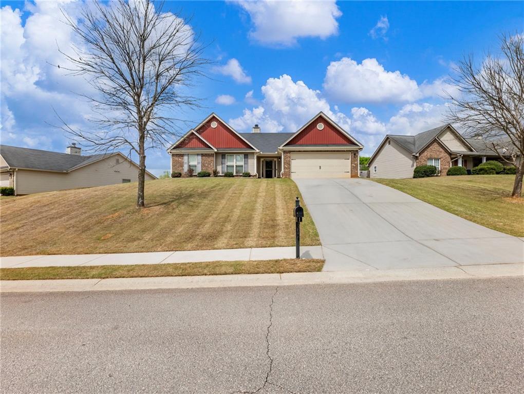 476 River Mist Circle Jefferson, GA 30549 - Photo 39 of 44 a view of house with yard