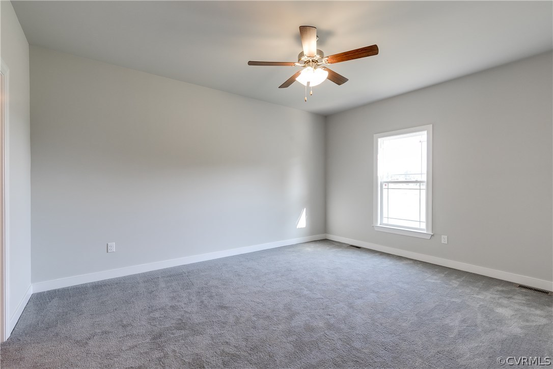 90 Hickory Ridge Circle Mineral, VA 23117 - Photo 12 of 23 an empty room with a window and a fan