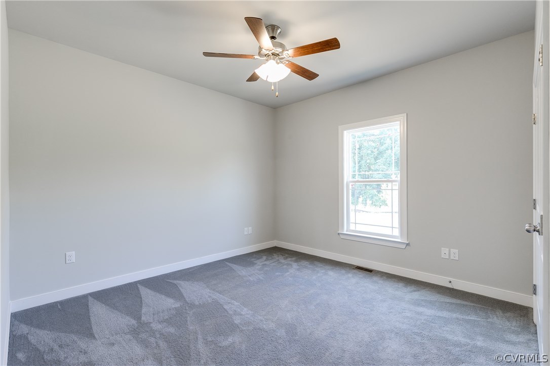 90 Hickory Ridge Circle Mineral, VA 23117 - Photo 15 of 23 an empty room with windows and ceiling fan
