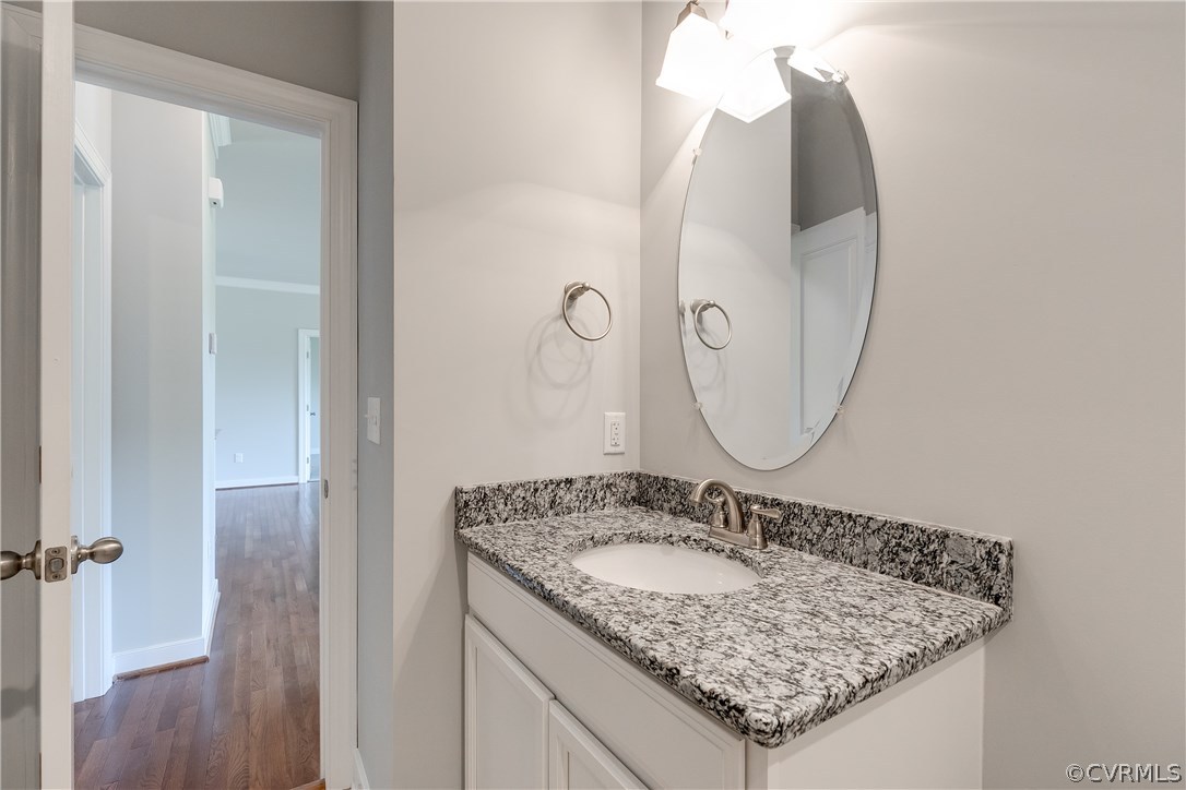 90 Hickory Ridge Circle Mineral, VA 23117 - Photo 20 of 23 a bathroom with a granite countertop sink and a mirror