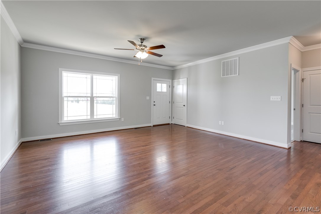 90 Hickory Ridge Circle Mineral, VA 23117 - Photo 4 of 23 a view of an empty room with wooden floor and window